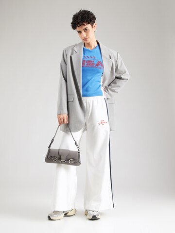 EA7 Emporio Armani Loose fit Trousers 'TRAIN CLUB HOUSE' in White