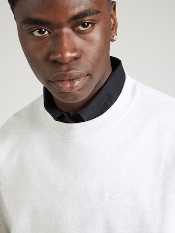 Nike Sportswear Sweatshirt 'SOLO' in Grau