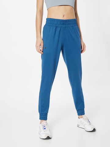 Effilé Pantalon de sport 'Meridian' UNDER ARMOUR en bleu : devant