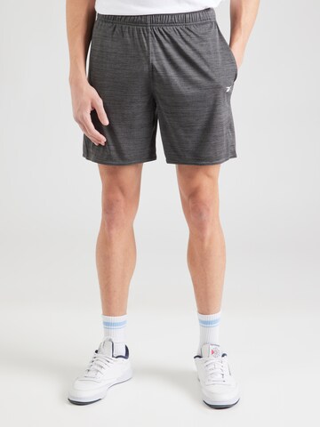 Reebok regular Παντελόνι φόρμας 'ID TRAIN' σε μαύρο: μπροστά