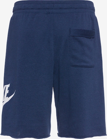 Nike Sportswear Loosefit Housut 'Club Alumini' värissä sininen
