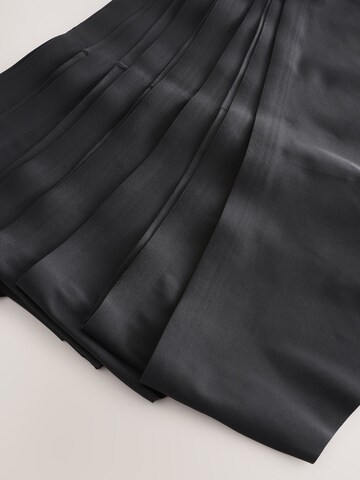 String Next en noir
