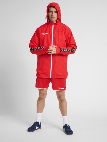 Veste de sport Hummel en rouge