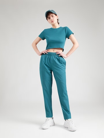 UNDER ARMOUR Ozke Športne hlače 'Unstoppable' | zelena barva