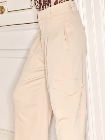 Ema Louise x ABOUT YOU Regular Pleat-front trousers 'Lena' in Beige