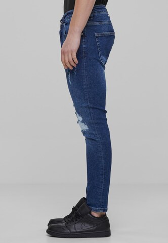 Karl Kani Slimfit Jeans in Blau