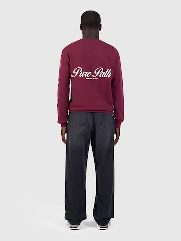 Sweat-shirt Pure Path en rouge