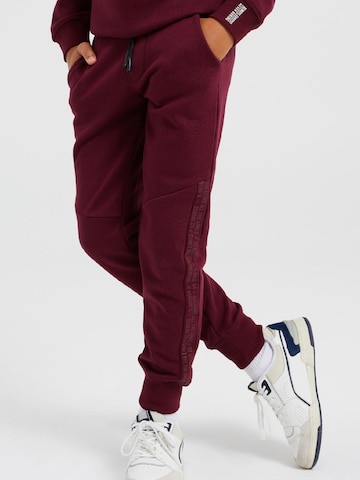 WE Fashion Tapered Pants in Red: front