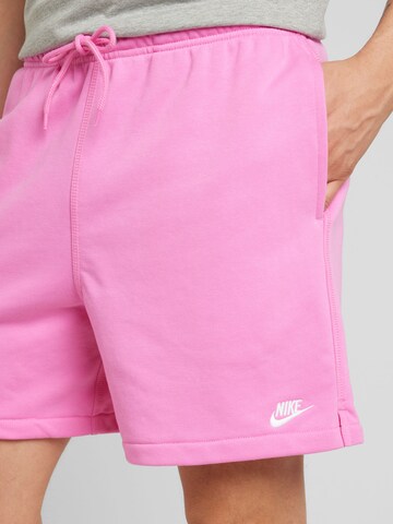 Nike Sportswear Loose fit Trousers 'CLUB' in Pink
