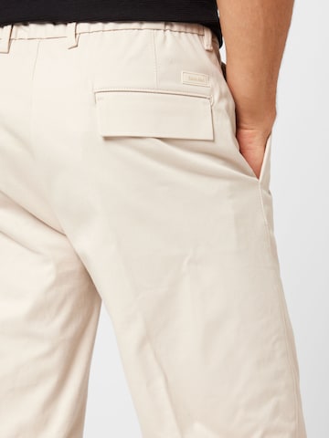 Calvin Klein Regular Pleat-front trousers in Beige