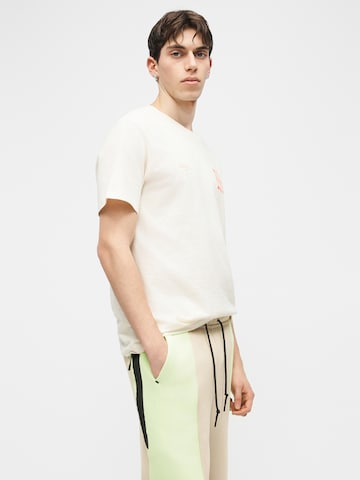 Nike Sportswear Normální Kalhoty 'TECH FLC' – béžová