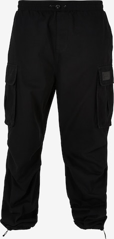Karl Kani Loose fit Cargo trousers in Black: front