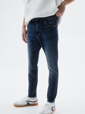 Slimfit Jeans de la Pull&Bear pe albastru: față