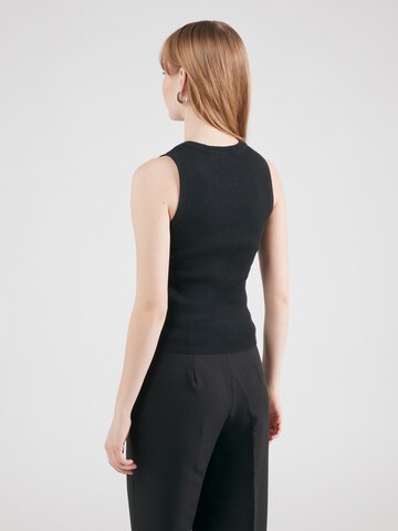 DKNY - Top de punto en negro