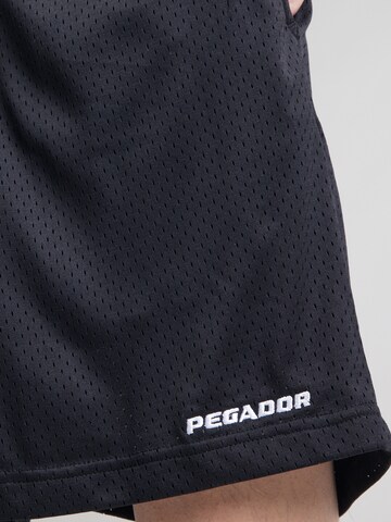 Loosefit Pantaloni di Pegador in nero