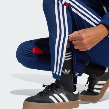 ADIDAS PERFORMANCE Tapered Sports trousers 'Tiro 25 Essentials' in Blue