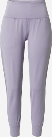Effilé Pantalon de sport 'Meridian' UNDER ARMOUR en violet : devant