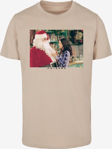 ABSOLUTE CULT T-Shirt 'Friends - Santa Chandler' in Beige: predná strana