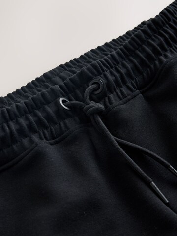 Next Tapered Broek 'Active Training Division' in Zwart