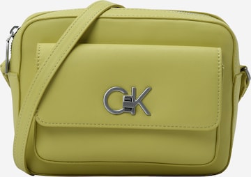 Calvin Klein - Mala de ombro em amarelo: frente
