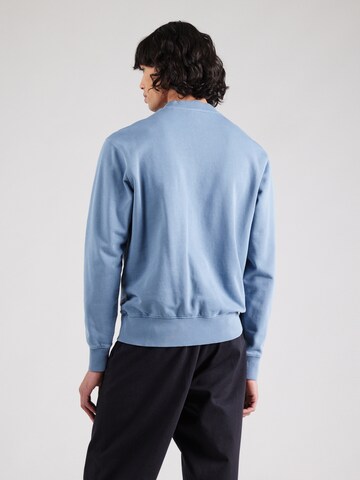 BOSS Sweatshirt 'We__Dye' i blå