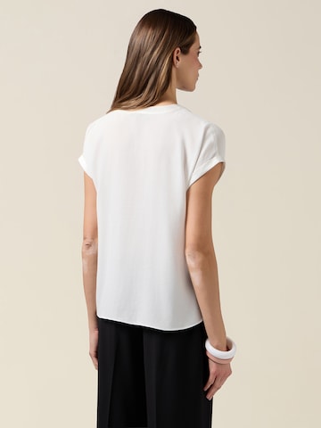 Camicia da donna di oltre in bianco