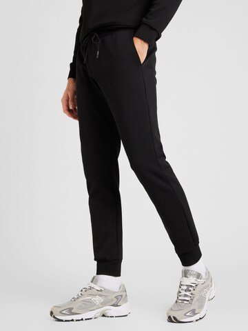 ANTONY MORATO Tapered Pants in Black: front