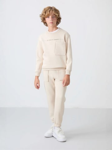 Tommy Life Trainingspak 'TOMMY Kinder Active Set' in Wit: voorkant
