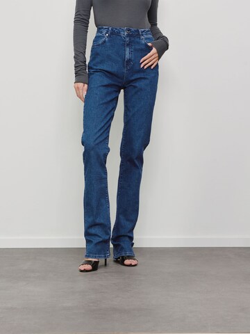 RÆRE by Lorena Rae Flared Jeans in Blue: front