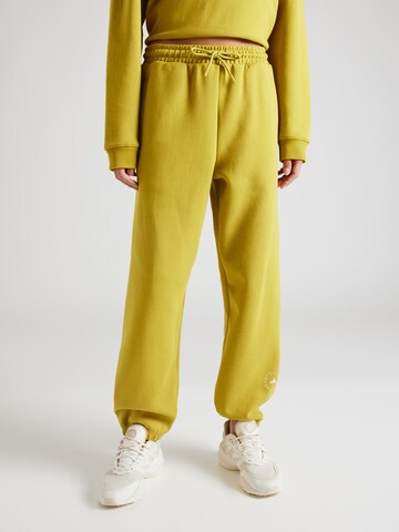 ADIDAS BY STELLA MCCARTNEY - Tapered Calças de desporto em amarelo: frente