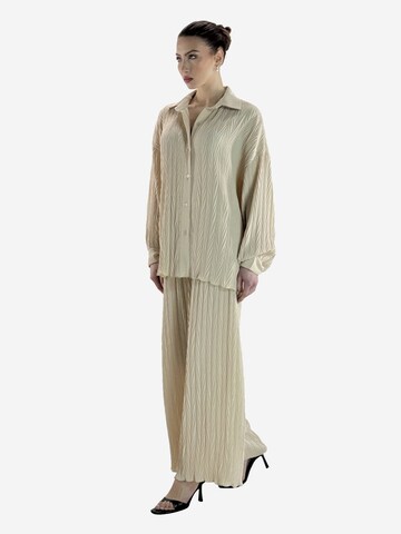 Elara Buksedragt i beige