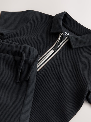 Next - Conjunto en negro