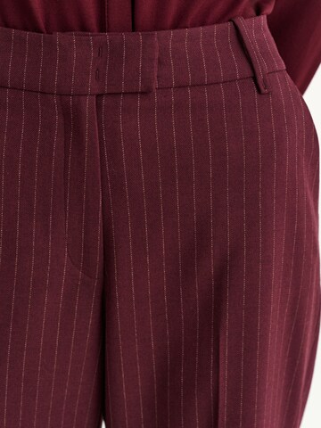 regular Pantaloni con piega frontale 'Zariana 1' di TATUUM in rosso