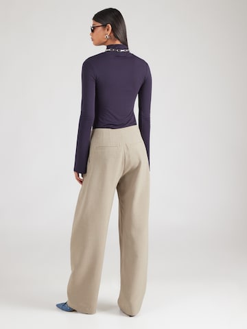 Wide leg Pantaloni cutați de la IRO pe verde