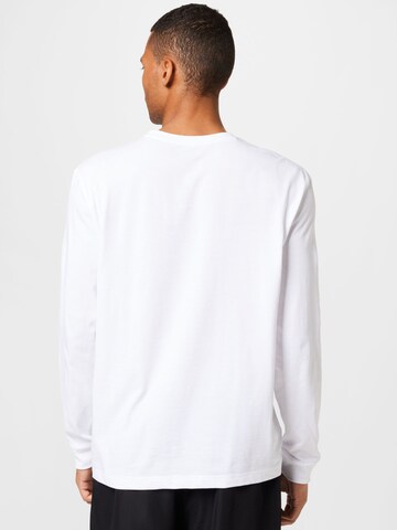 T-Shirt fonctionnel Lacoste Sport en blanc