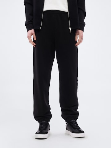 Calvin Klein Loosefit Kalhoty – černá: přední strana