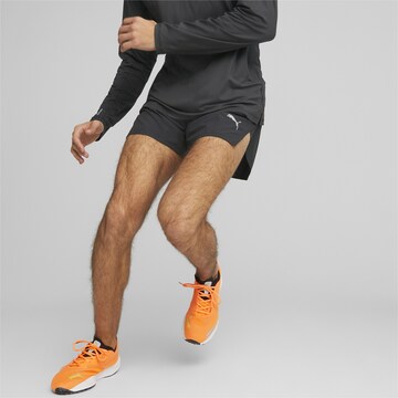 PUMA Regular Workout Pants 'ULTRAWEAVE' in Black: front