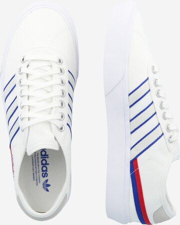 Baskets basses 'Delpala' ADIDAS ORIGINALS en blanc