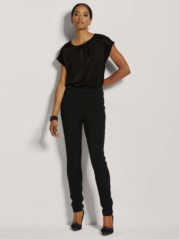 MADELEINE Slimfit Hose in Schwarz