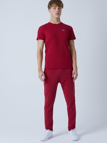 Coupe slim Pantalon de sport 'Slim Training Pants' SPORTKIND en rouge