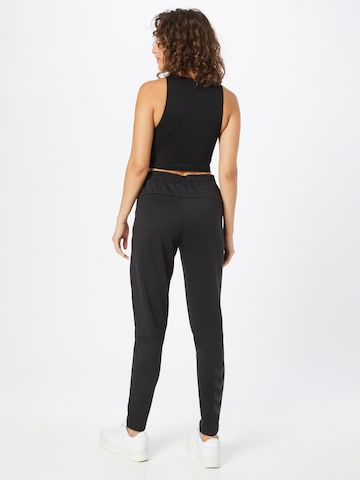 Regular Pantaloni sport 'Essi' de la Hummel pe negru