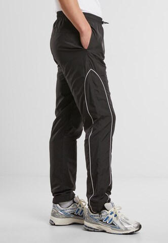 Urban Classics Свободный крой Штаны в Черный