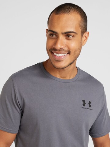 Maglia funzionale di UNDER ARMOUR in grigio