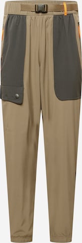 UNDER ARMOUR Tapered Sportsbukser 'Rush' i grøn: forside