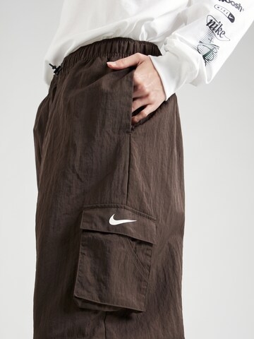 Loosefit Pantaloni cu buzunare de la Nike Sportswear pe maro