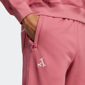ADIDAS SPORTSWEAR Tapered Workout Pants 'FC Arsenal Chinese Story' in Pink