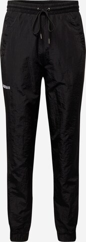 Han Kjøbenhavn Tapered Pants in Black: front