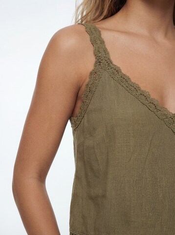 Haut studioselect en vert