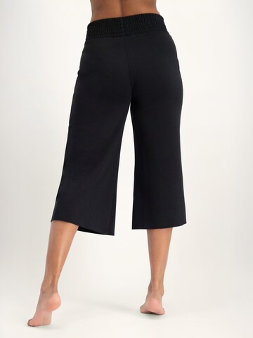 Urban Goddess Yoga & Activewear Flared Hose 'Flow' in Schwarz