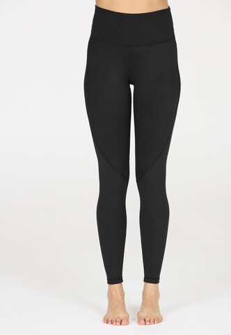 Athlecia Skinny Leggings in Black: front